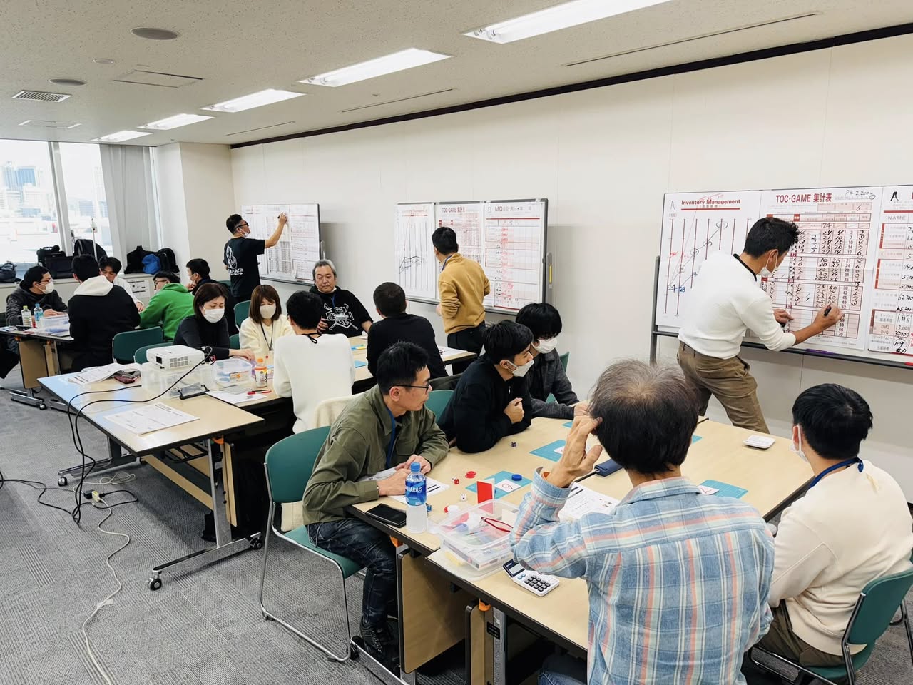 JQUALIAの研修の様子 — 数字と向き合う参加者